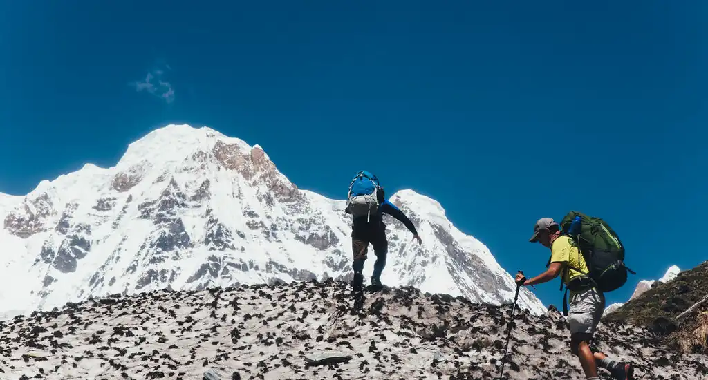 2 Trekkers with Backpack on trail of Annapurna Circuit Trekking