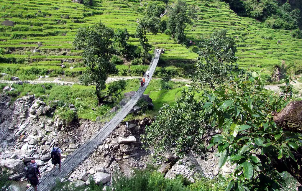 Crossing a long Suspension Bridge: Tsum Valley trek