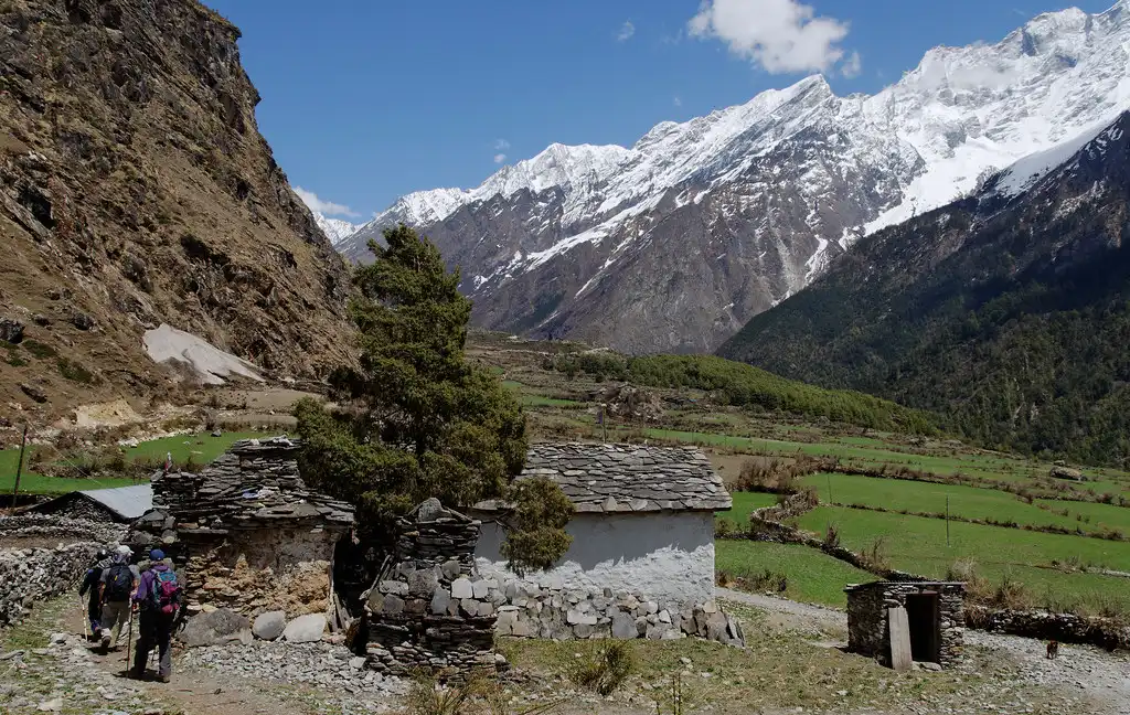 Trekkers entering upper Tsum Valley, a hidden valley of refuge on the border with Tibet