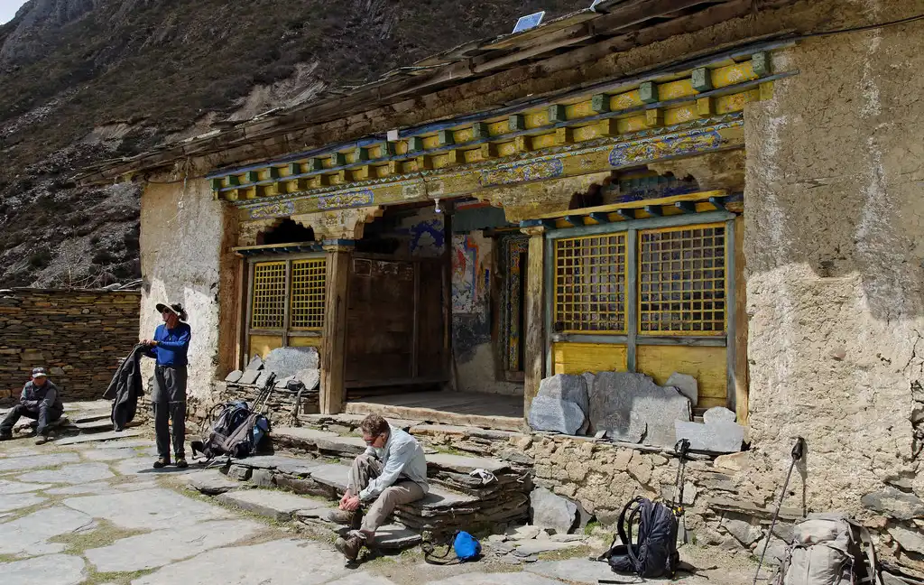 Trekkers resting at Mu Gompa