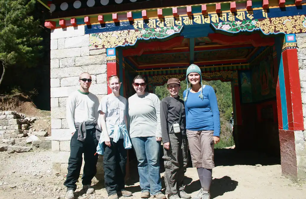 Group of trekkers standing in front of the entry gate to Sagarmatha National Park, Nepal